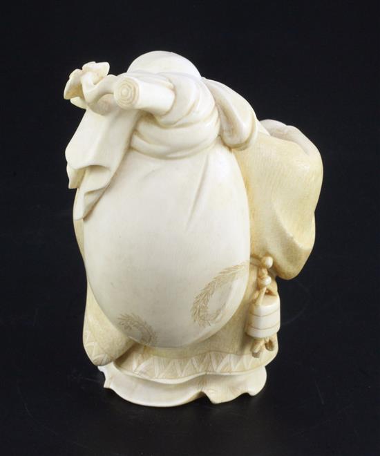 A Japanese ivory figure of Hotei, early 20th century, 10.3cm